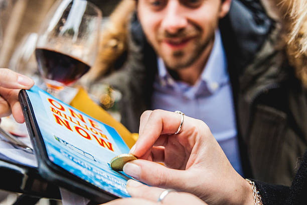 People holding money and lottery ticket representing a million
